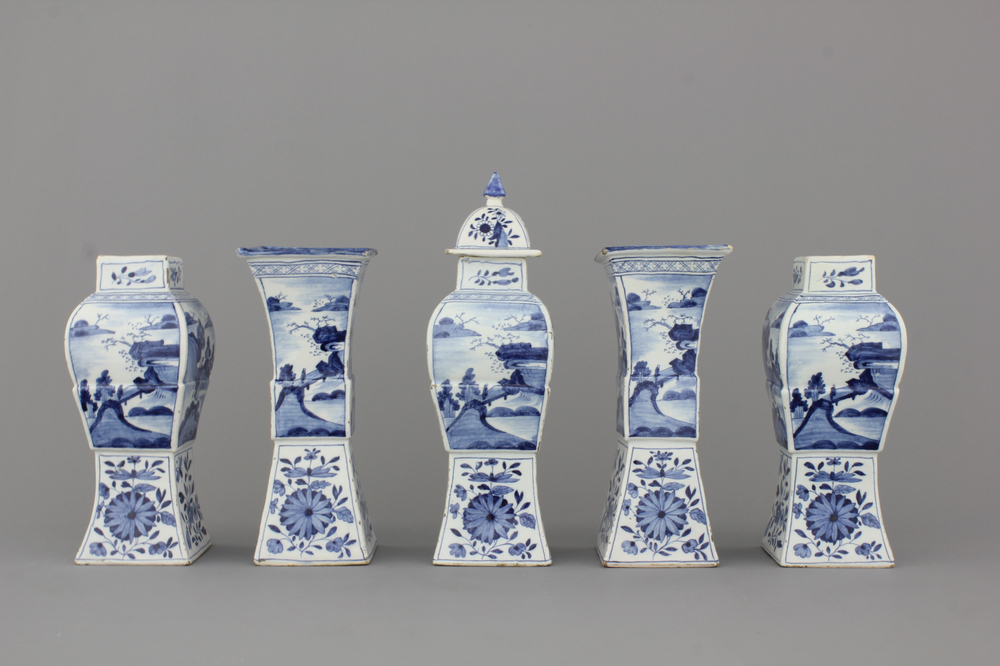 A Dutch Delft blue and white five-piece chinoiserie Kangxi style garniture, 18th C.