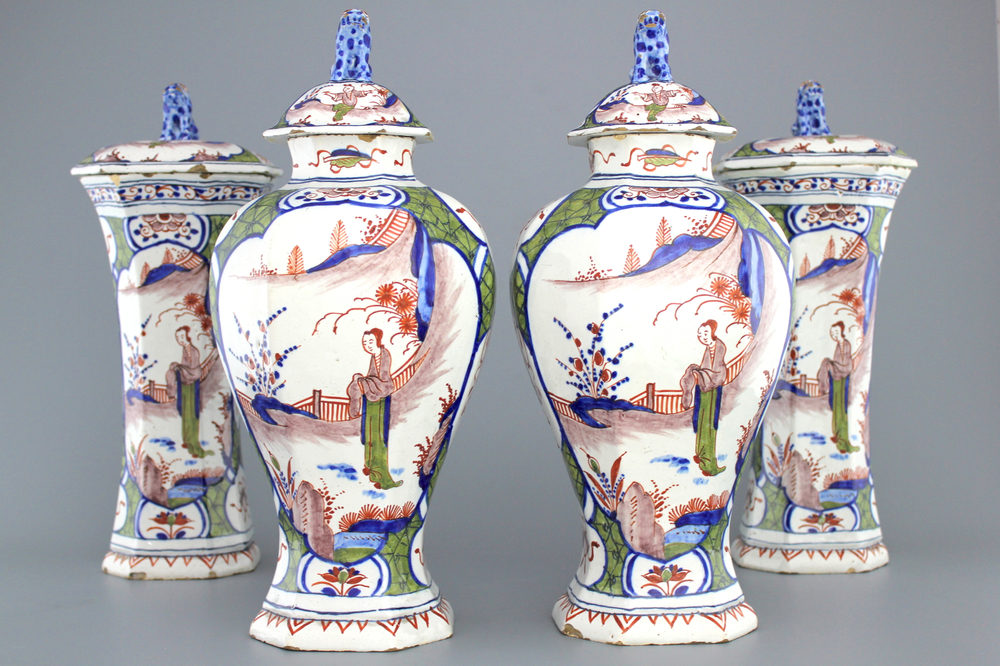 A Dutch Delft polychrome four-piece chinoiserie garniture with covers, early 18th C.