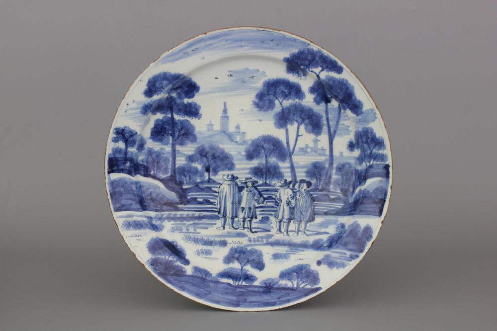 A Dutch Delft blue and white dish with a fine &quot;open air&quot; decoration, ca. 1720