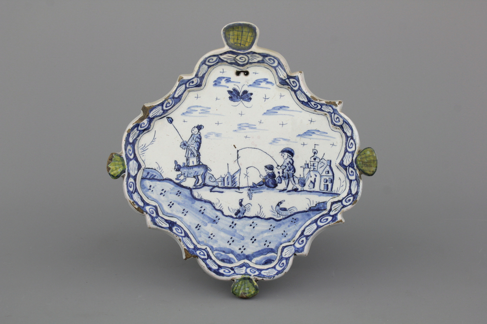 A Dutch Delft plaque with a chinoiserie fishing scene, 18th C.