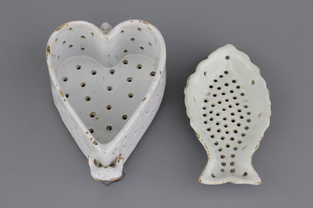 Two white Delft strainers, one in the form of a fish, 18th C.