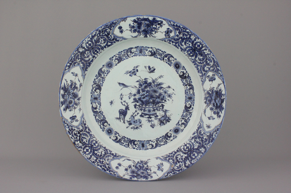A massive Rouen blue and white chinoiserie dish, late 17th C.
