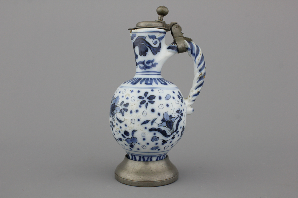 A Dutch Delft blue and white pewter-mounted jug, ca. 1700