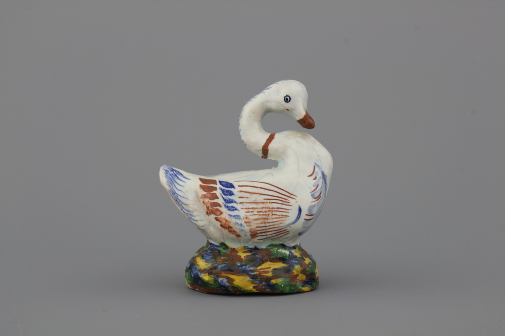 A Dutch Delft polychrome model of a swan, 18th C.