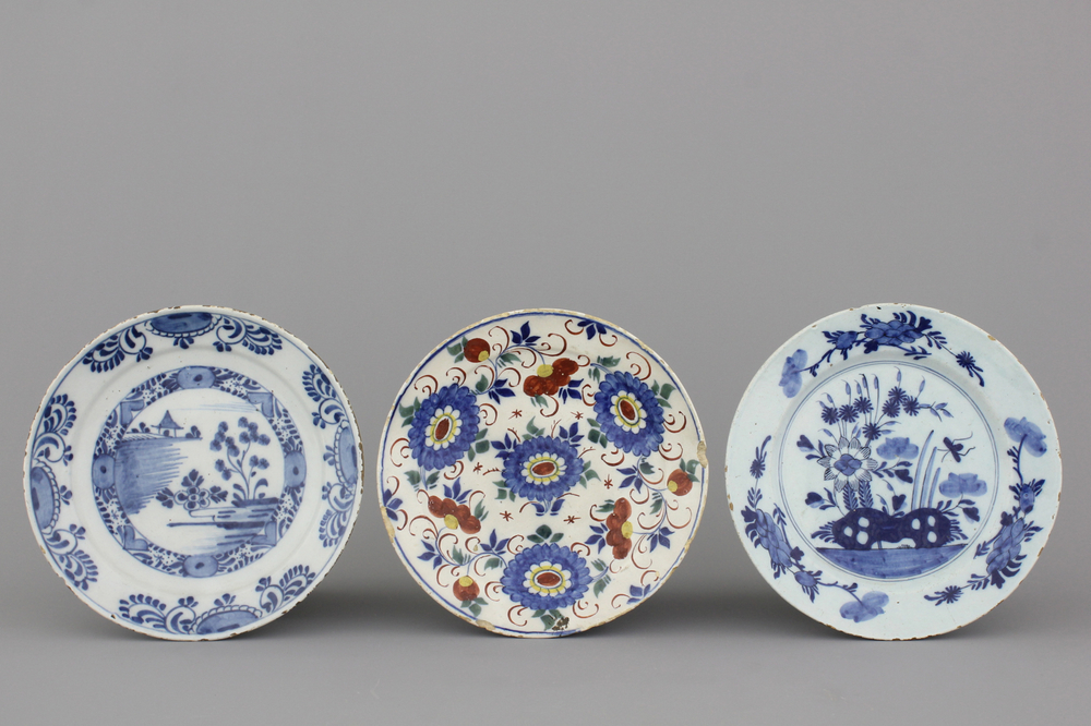 A group of 3 Dutch Delft blue and white and polychrome plates, 18th C.