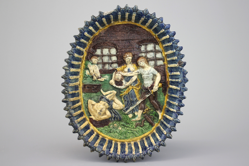A French Palissy school oval dish on foot, &quot;The decapitation of Holofernes&quot;, 17th C.