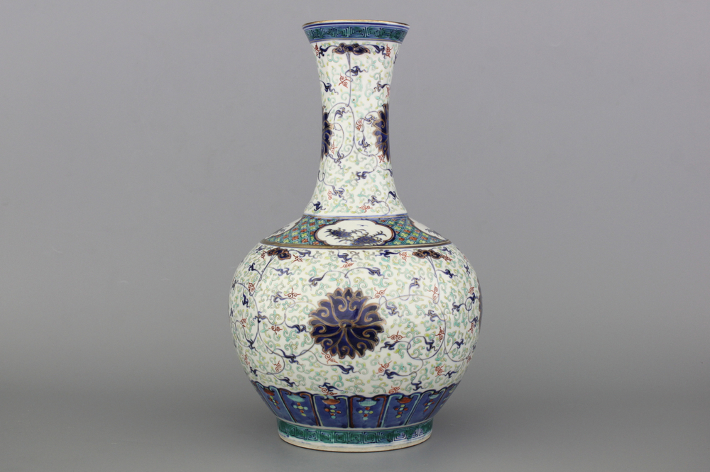 A Chinese porcelain doucai and gilt bottle vase, 19th C.