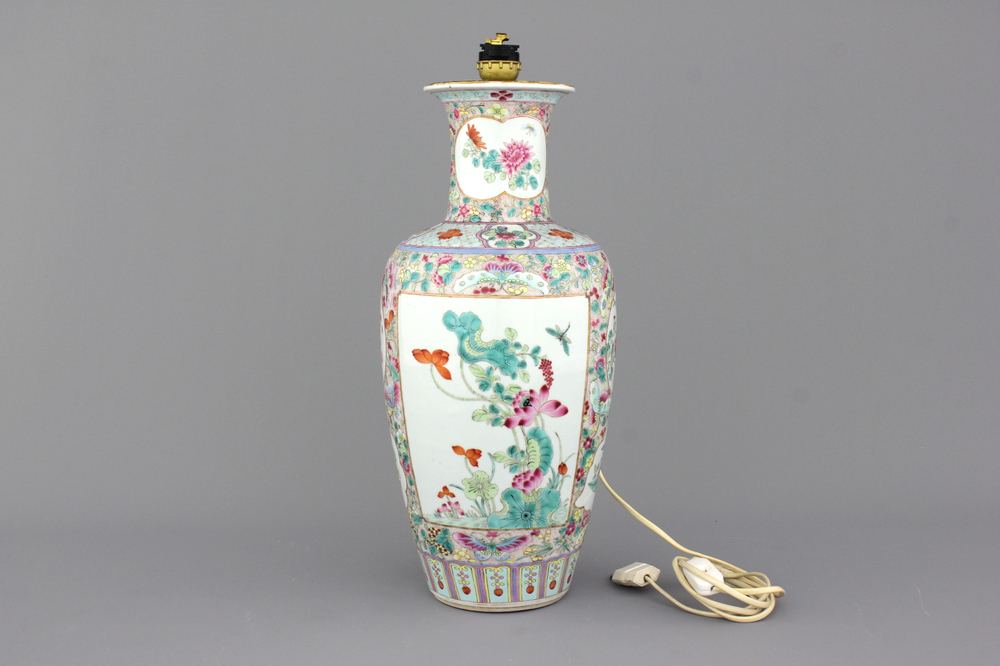 A Chinese porcelain famille rose vase with floral sprigs and butterflies, mounted as lamp, 19th C.