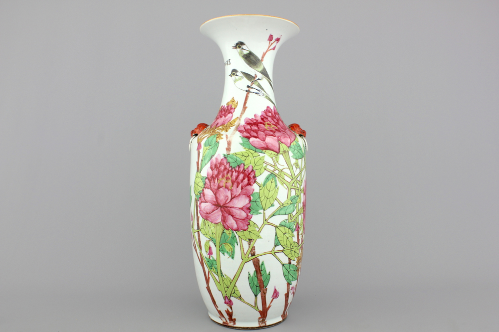 A large Chinese porcelain vase decorated with birds and floral branches, 19th C.