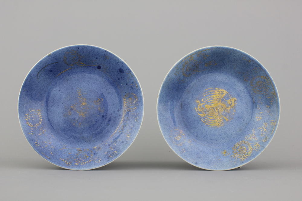 A pair of Chinese porcelain powder blue and gilt plates, 18th C.