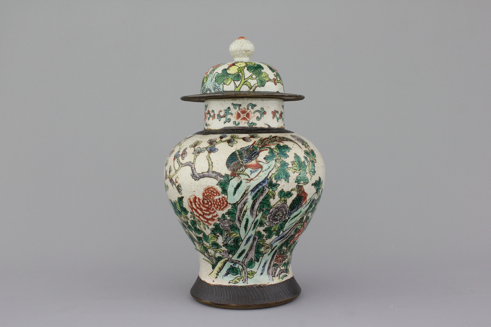 A Chinese porcelain famille verte Nanking vase and cover, 19th C.