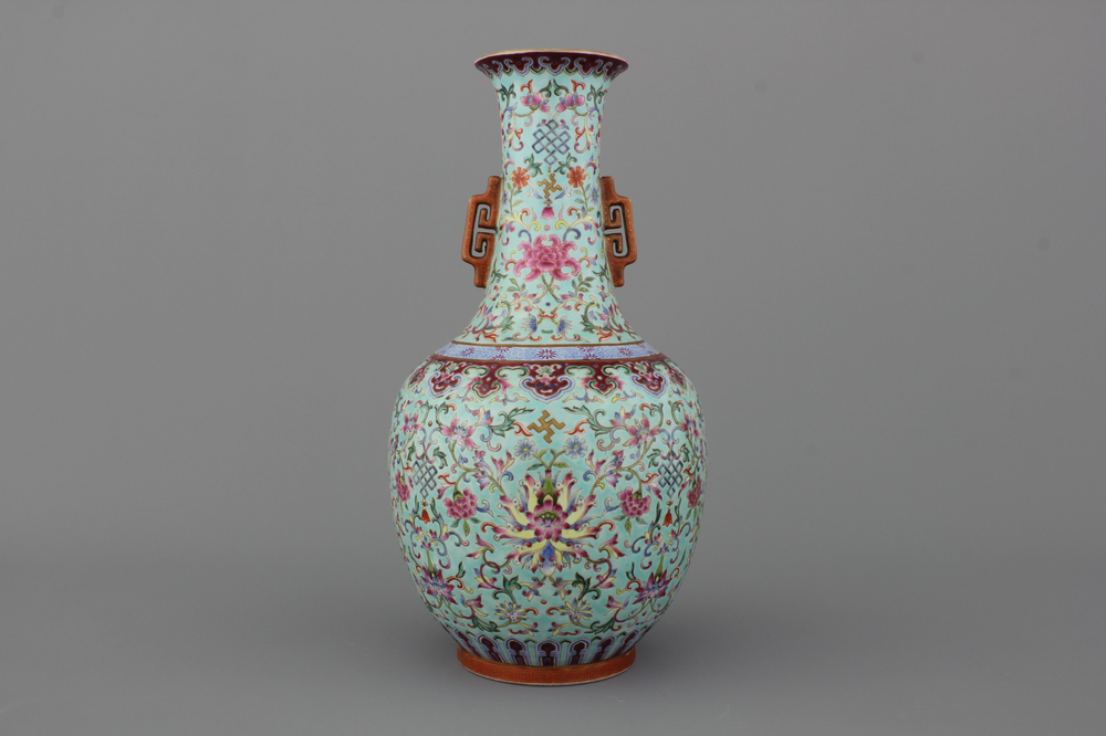 A Chinese porcelain turquoise ground famille rose &quot;Happiness&quot; vase, 20th C.