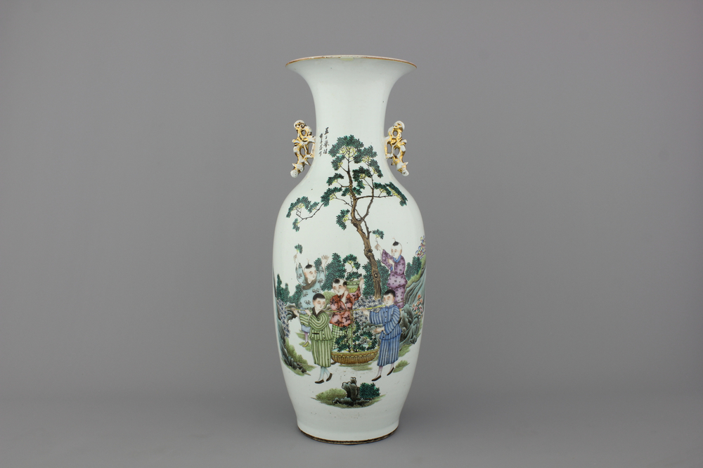 A Chinese porcelain vase with boys playing in a garden, 19/20th C.