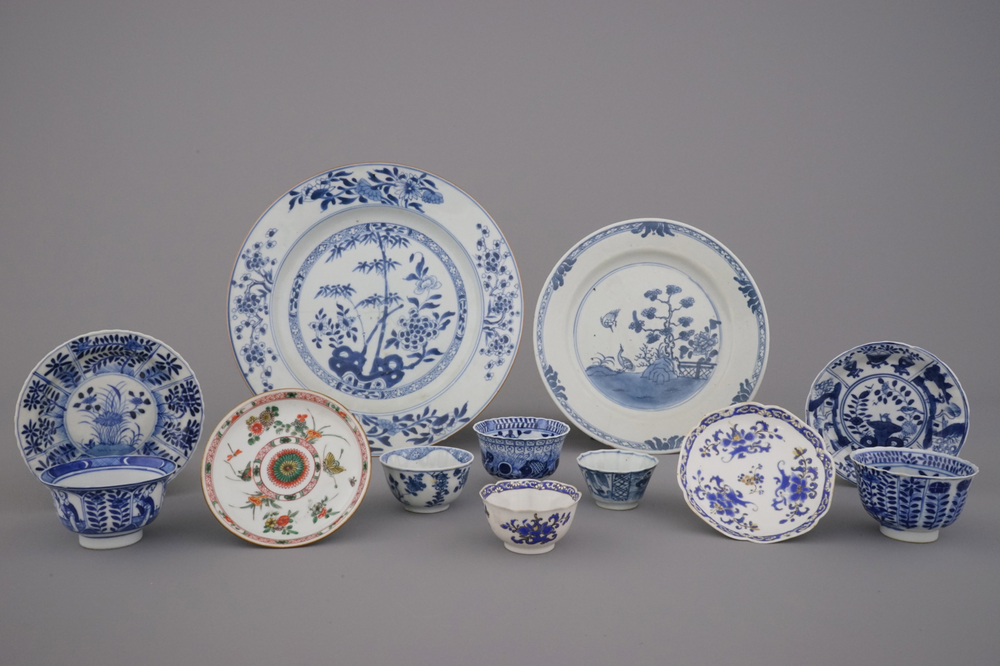 A collection of mostly blue and white Chinese porcelain plates, cups and saucers, 18/19th C.