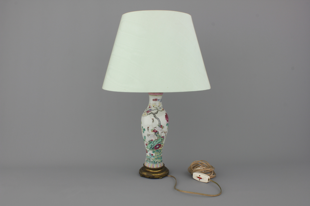 A Chinese porcelain famille rose vase mounted as lamp, 18th C., Qianlong