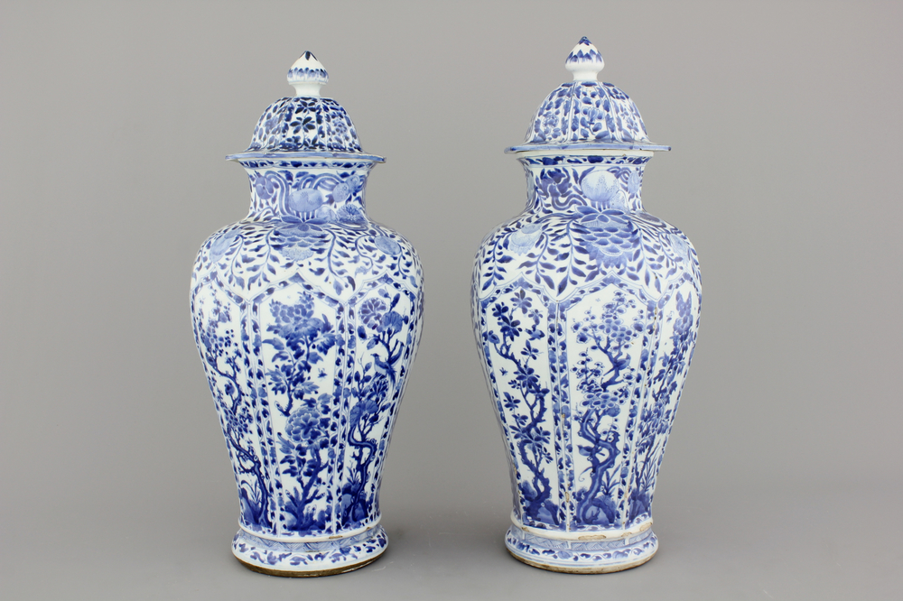 A pair of Chinese porcelain blue and white vases and covers, Kangxi, ca. 1700