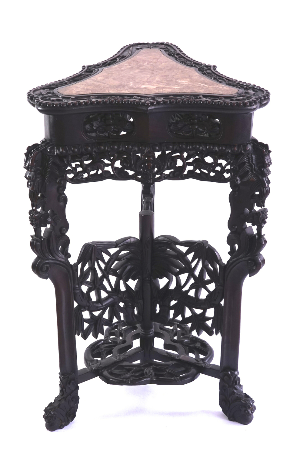A Chinese carved wood and marble triangular vase stand
