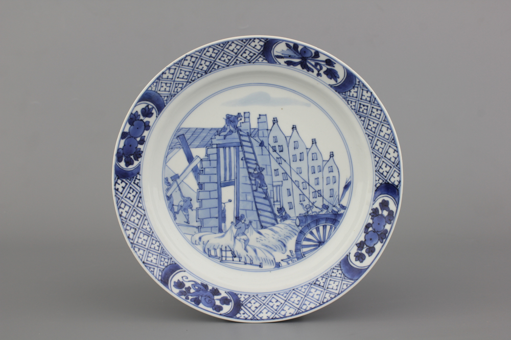 A Chinese porcelain blue and white plate with a &quot;Rotterdam Riot&quot; decor, Kangxi