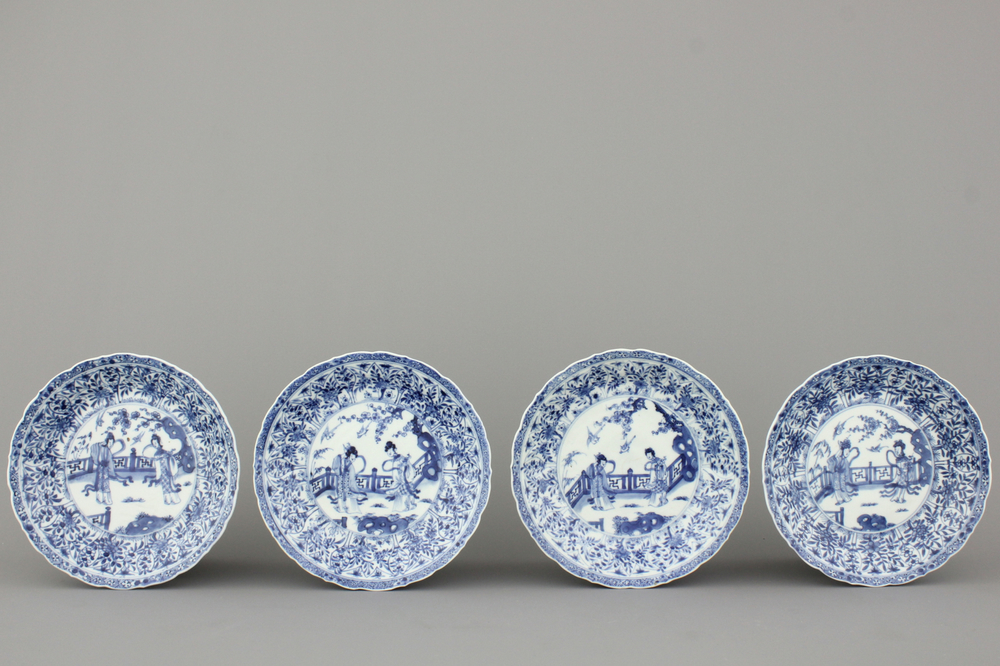 A set of 4 Chinese porcelain blue and white plates with ladies in a garden, Kangxi, early 18th C.