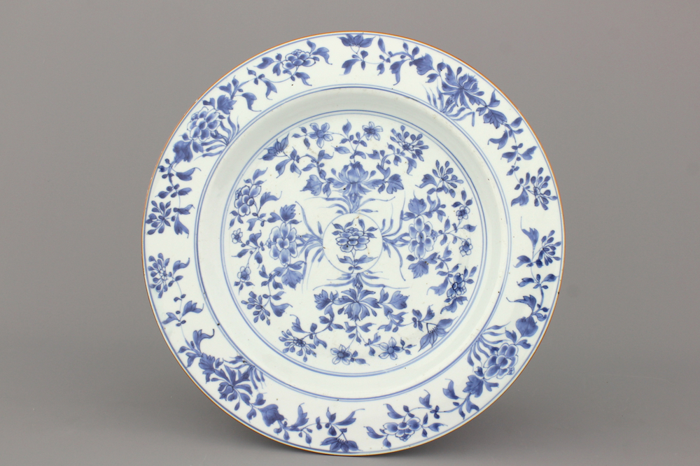 A large Chinese porcelain blue and white floral dish, Kangxi