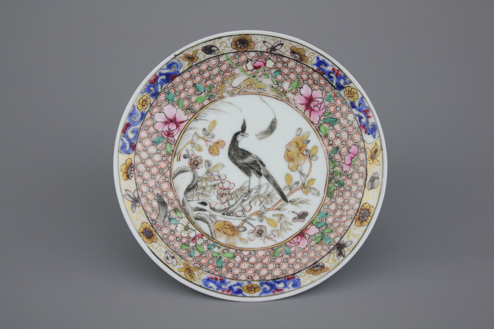 A Chinese porcelain famille rose grisaille saucer, Yongzheng, 18th C.