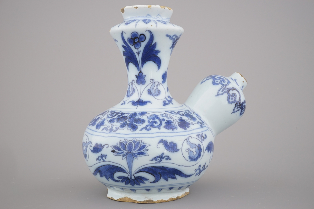 A Dutch Delft blue and white chinoiserie Kendi, late 17th C.