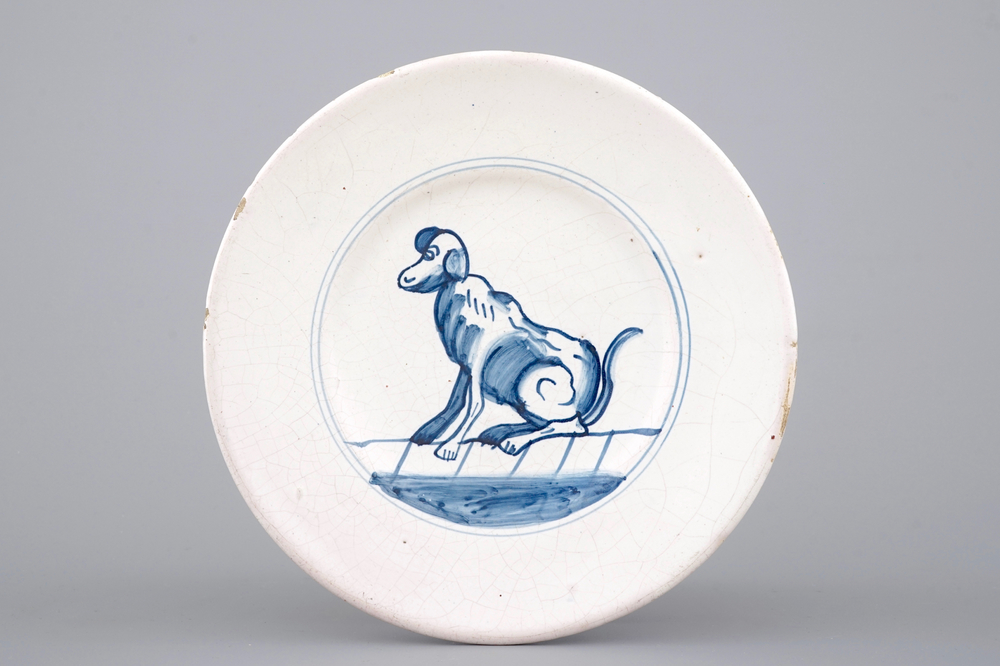 An early Dutch Delft plate with a dog, 17th C.