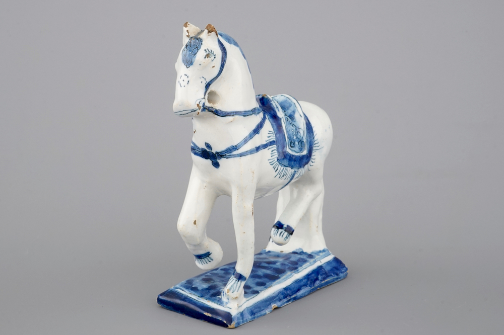 A fine Dutch Delft blue and white model of a standing horse, 18th C.