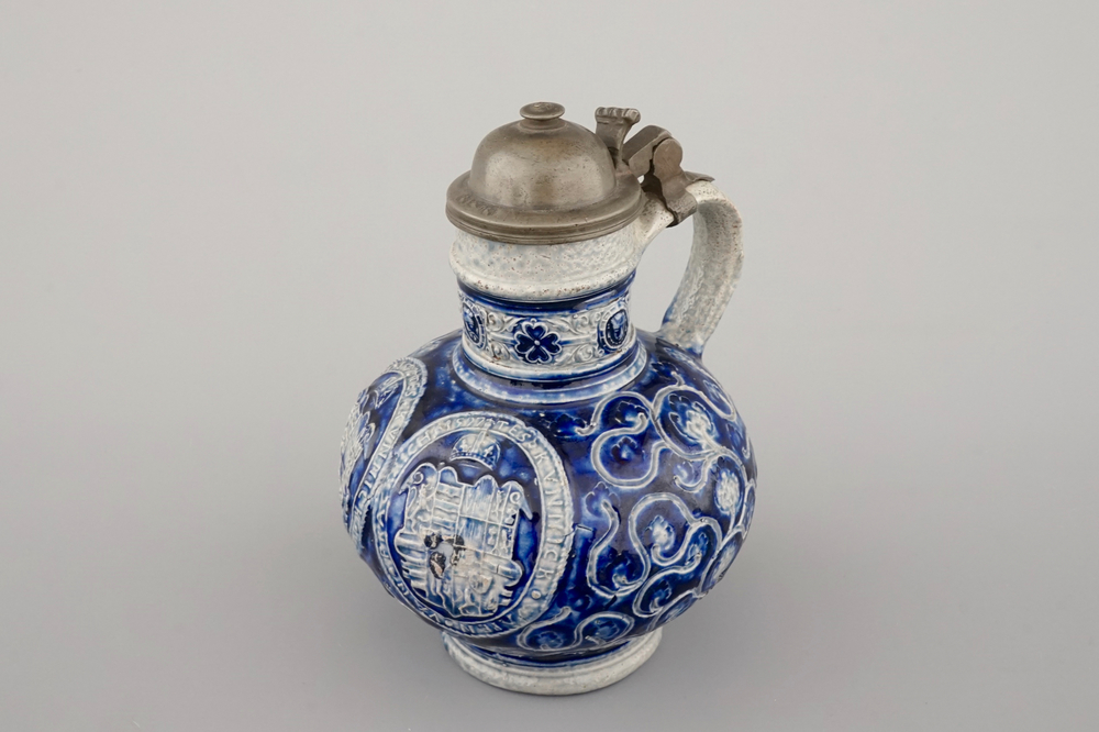 A fine Westerwald stoneware pewter-mounted jug with the coat of arms of France, dated 1597