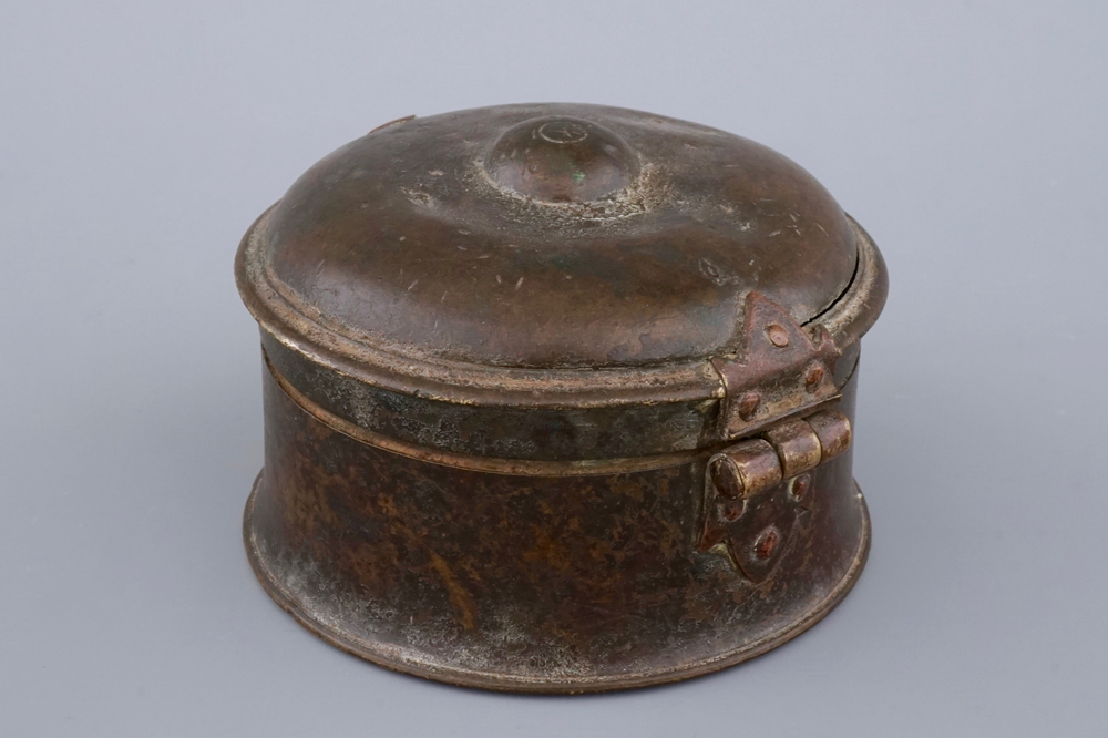 A cylindrical partly gilt box and cover, 16/17th C.