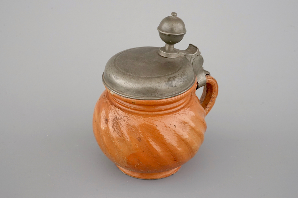 An unusual small Bunzlau pewter-mounted stoneware jug, ca. 1700
