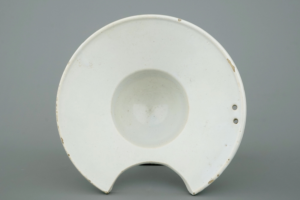 A white Delft shaving bowl, 18th C.