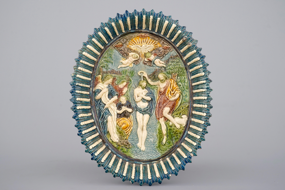 An oval Palissy style dish with the baptism of Christ, 17th C.