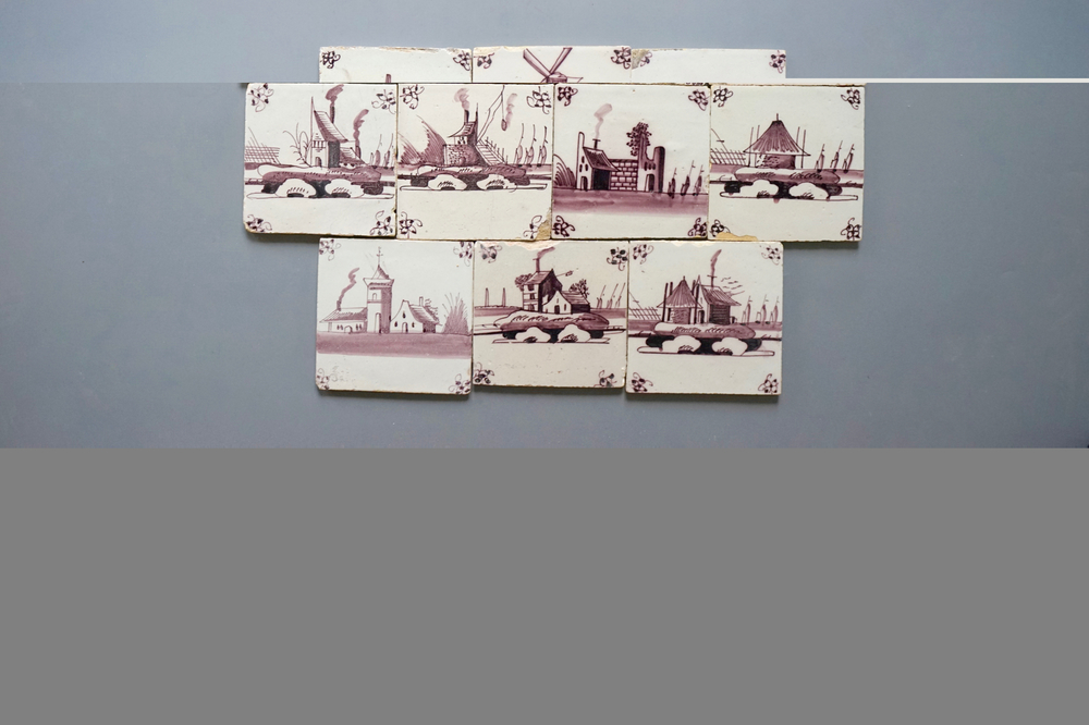 A set of 14 Dutch Delft manganese tiles with landscapes, 18th C.