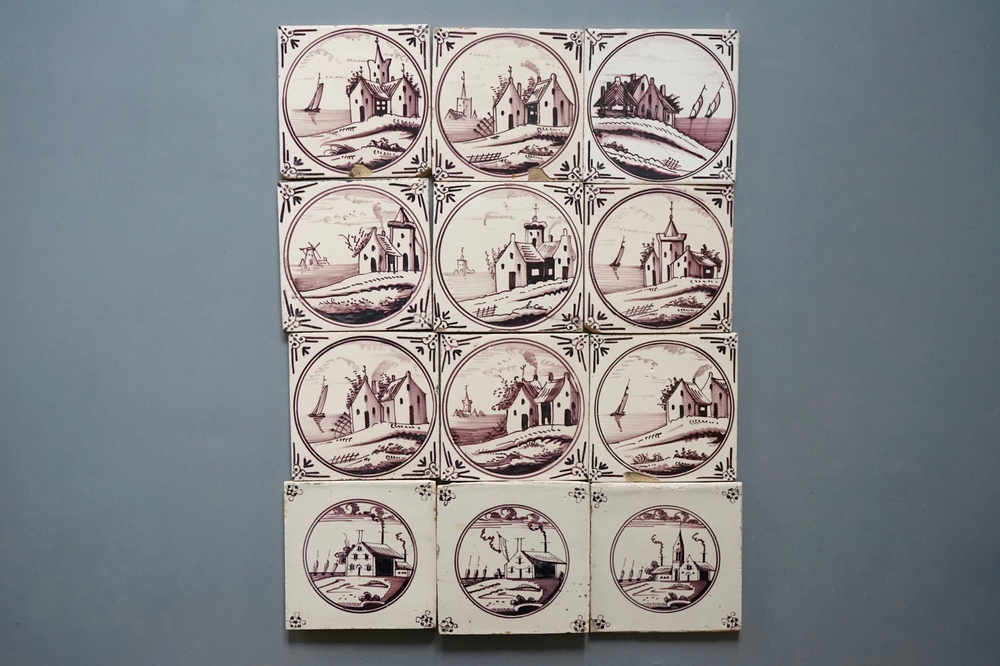 Een set van 12 Delftse tegels in mangaan met landschapjes, 18/19e eeuw