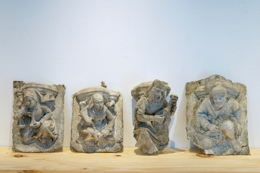 A set of four plaster casts of gothic consoles, 19/20th C., Bruges