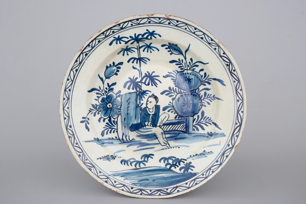 A Dutch Delft blue and white chinoiserie cardinal's dish, 18th C.