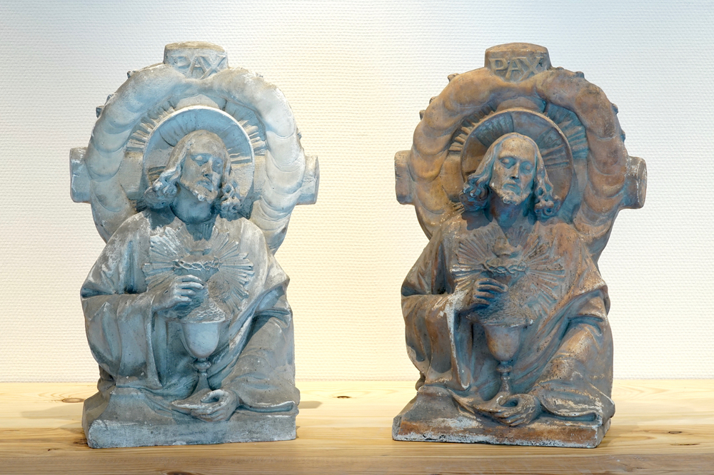 A pair of plaster cast reliefs of Christ with a chalice, 19/20th C., Bruges