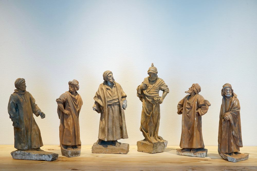 A set of six plaster figures from the retable of Caux, 19/20th C., Bruges