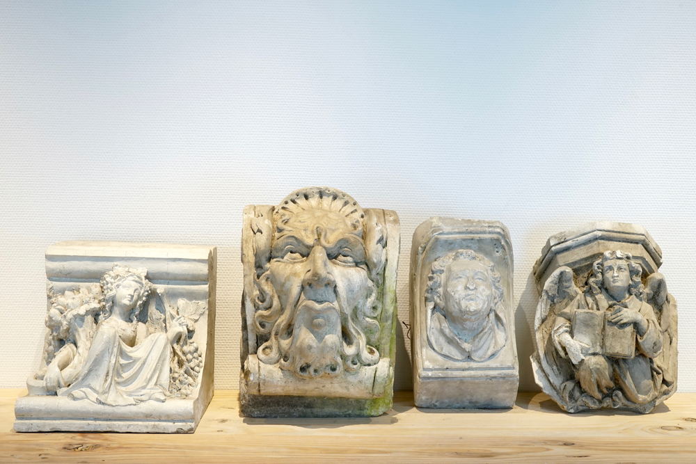 A set of four plaster casts of wall consoles, 19/20th C., Bruges