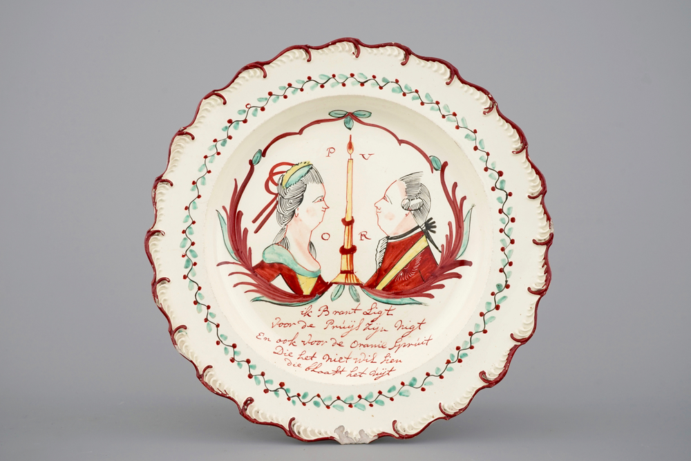 A rare Dutch-decorated English Leeds creamware royal portrait plate, 18th C.