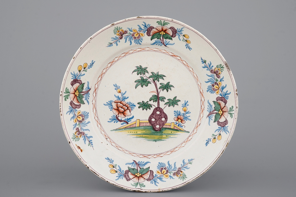 A polychrome French faience dish with floral decoration, North of France, 18th C.