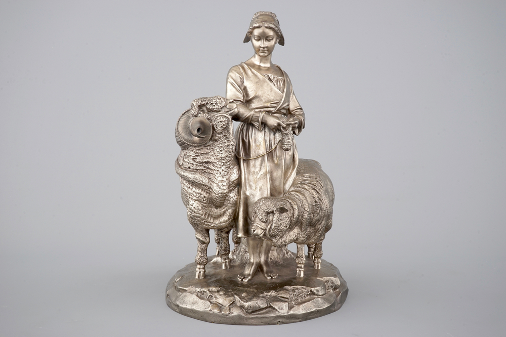 Une groupe en bronze argent&eacute; de Christofle et Cie.  d'une fille avec un mouton et un b&eacute;lier, 19&egrave;me