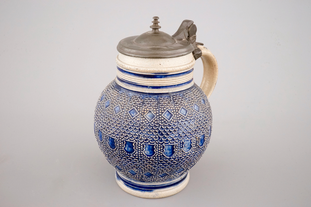 A globular Westerwald stoneware jug with applied decoration, 17th C.