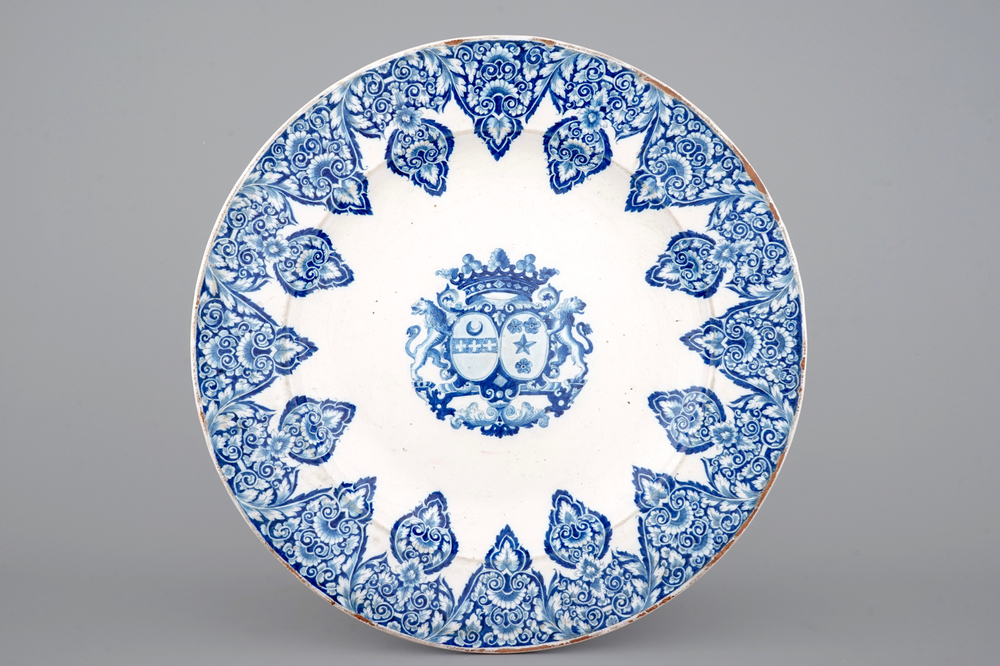 A massive French faience armorial dish, Rouen, 19th C.