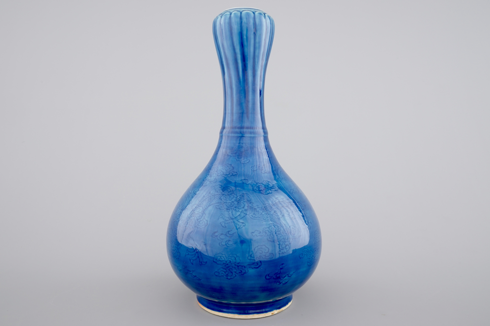 A Chinese monochrome blue garlic vase with incised dragon decoration, 19th C