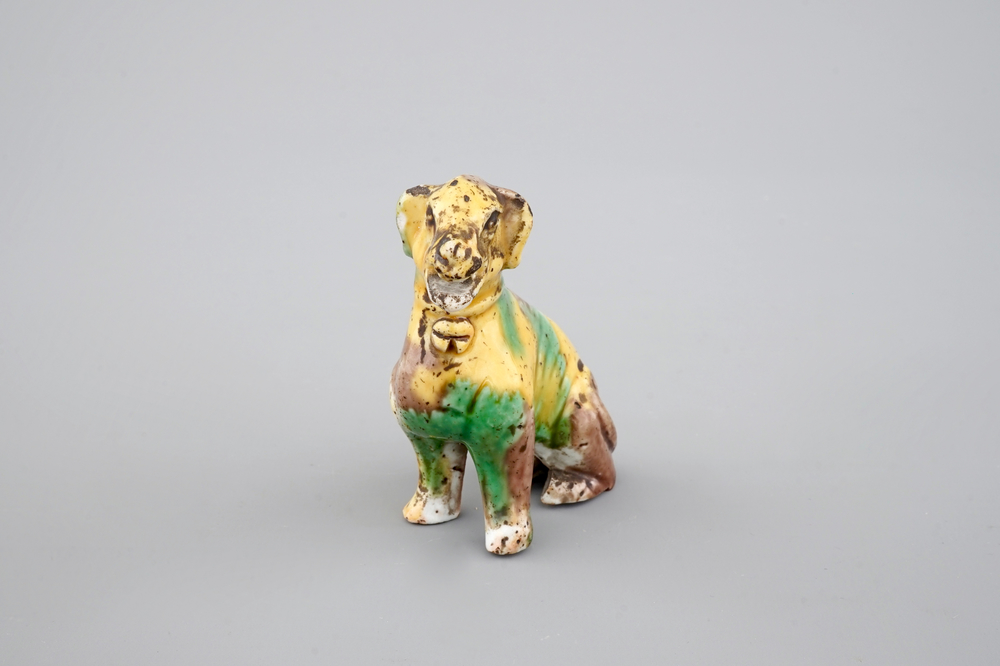 A Chinese spinach and egg glazed model of a dog, Kangxi, ca. 1700