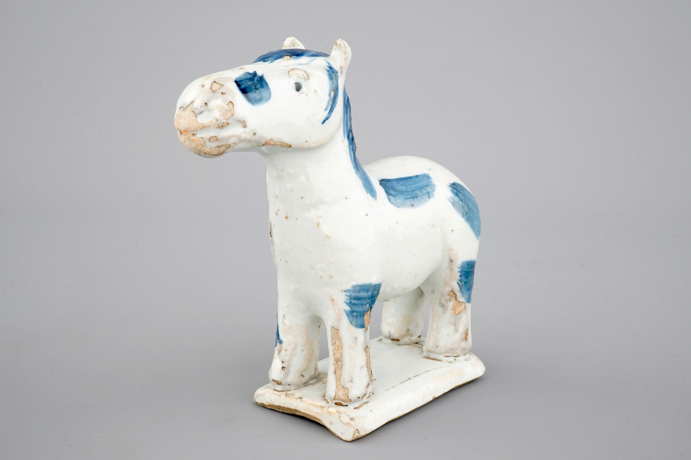 A blue and white Chinese porcelain figure of a horse for the Dutch market, 18th C.