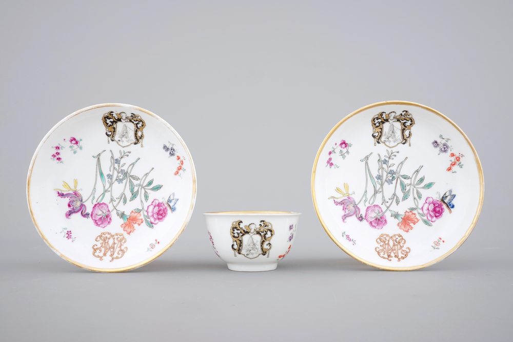 A fine Chinese armorial cup and two saucers, Qianlong, 18th C.