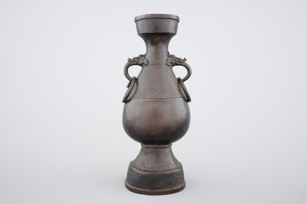 A Chinese bronze elongated bottle-shaped vase, Ming Dynasty